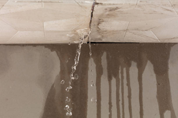 Professional Water Damage Restoration technician working in Arlington, NY